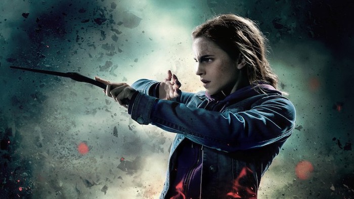 harry potter desktop background, emma watson as hermione granger, holding a wand, deathly hallows movie poster