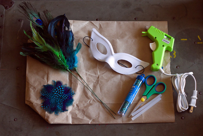 needed supplies for crafts, masquerade masks for couples, step by step diy tutorial, deathers and mask, glitter and glue