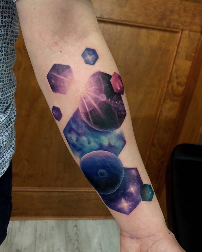 space tattoo ideas, honeycomb geometrical shapes, purple and blue galaxies inside the frames, forearm tattoo