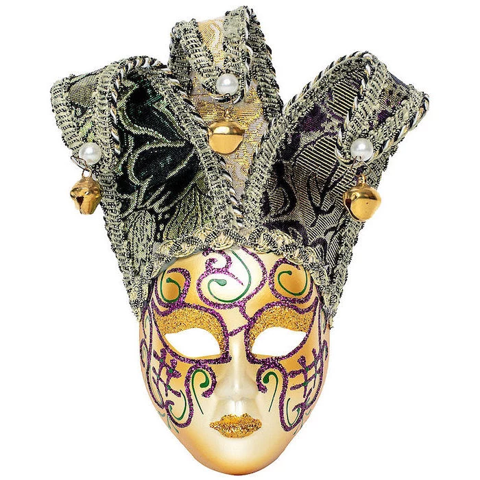 gold mask, decorated with purple and green glitter, gold masquerade mask, jester mask with bells at the end