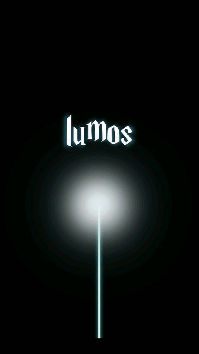 lumos written over black background, harry potter phone background, wand producing light underneath