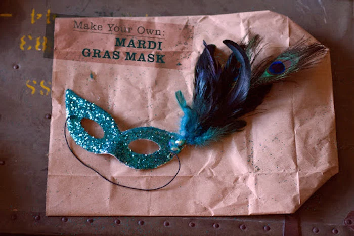 masquerade masks for couples, step by step diy tutorial, turquoise glitter mask, decorated with dark blue feathers