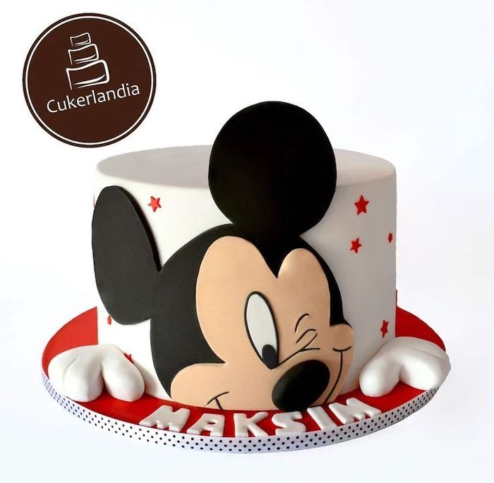 one tier cake, covered with white fondant, mickey mouse smash cake, mickey made of fondant, red stars on the cake