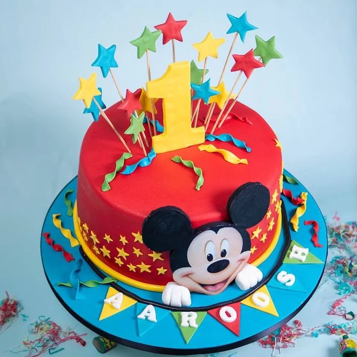 mickey mouse cake pops, one tier cake, covered with red fondant, fondant stars for cake toppers