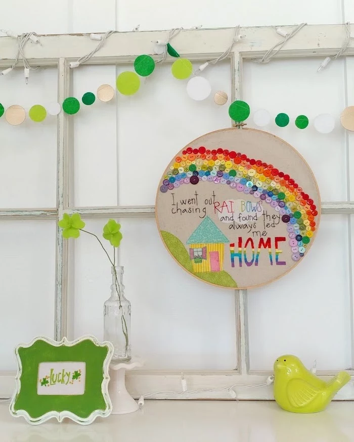 rainbow decoration made with buttons, st patricks day crafts, quote written over a child's drawing of a house