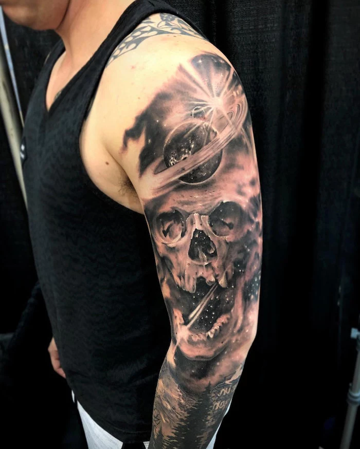 whole sleeve black and white tattoo, skull in the middle of space, surrounded by planets and stars, milky way tattoo