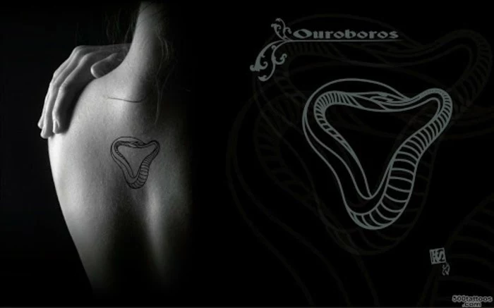feminine tattoos, back tattoo on a woman, black background