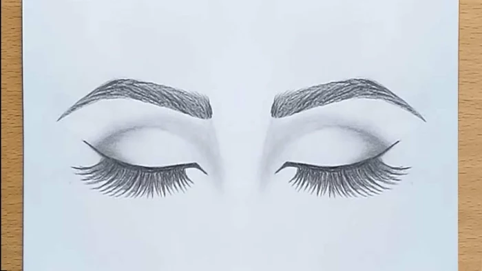 drawing of set of close eyes with long lashes, eyeliner and thick eyebrows above them, how to draw eyelashes, black pencil sketch
