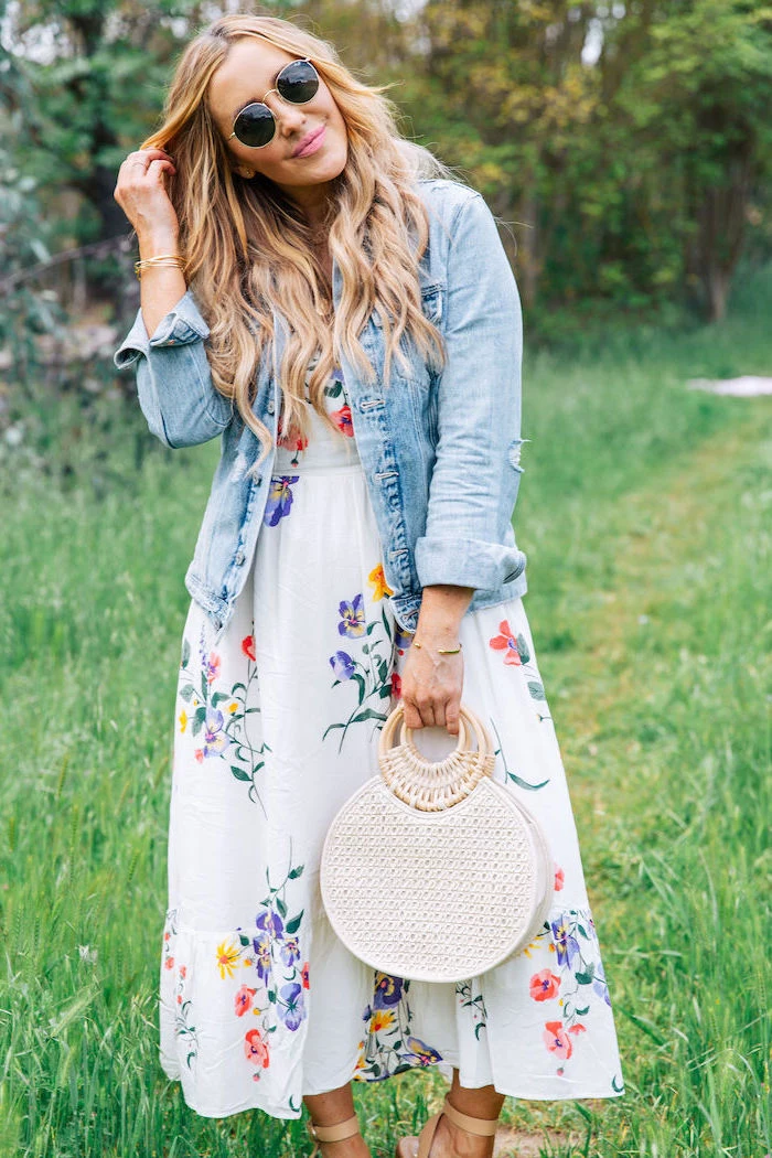 blonde woman wearing sunglasses, sundresses for women, wearing white dress with floral print, denim jacket on top