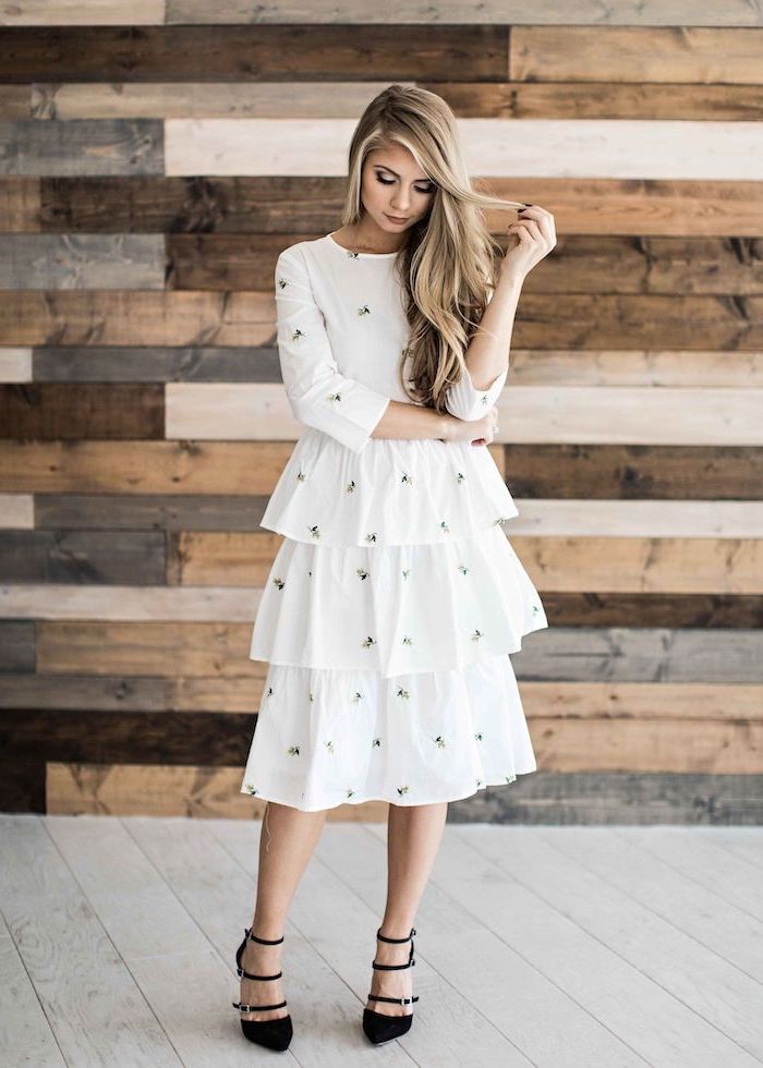 blonde woman wearing white dress, small flowers print on it, sundresses for women, black heels