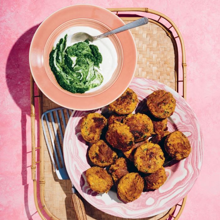 bowl of yoghurt and pesto, plate of hash brown next to it, easter dinner recipes, placed on wooden tray