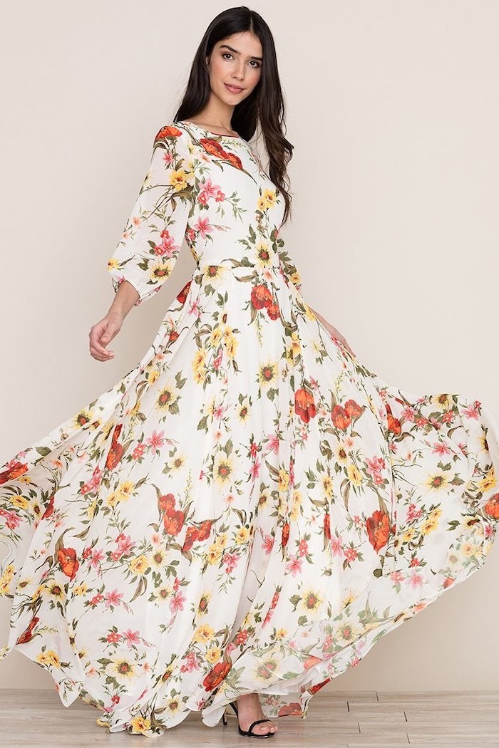 woman with long black hair, wearing a long white dress with floral print, black sandals, sunflower dress