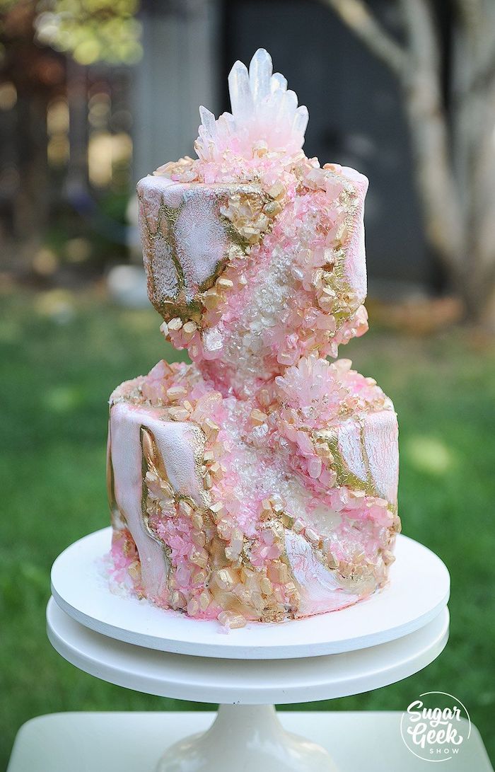 two tier cake, covered with white fondant, painted with silver and gold, geode cake, rock candy painted in gold and pink