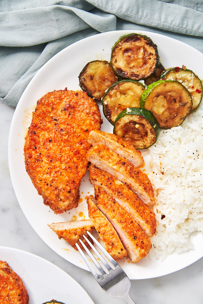 crusty pork chops, easy dinner recipes for beginners, roasted zucchini and white rice on the side