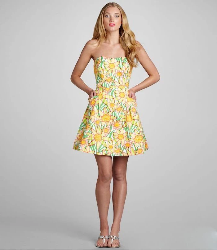 elsa hosk with blonde wavy hair, easter outfits women, wearing a dress with bare shoulders, sunflowers print
