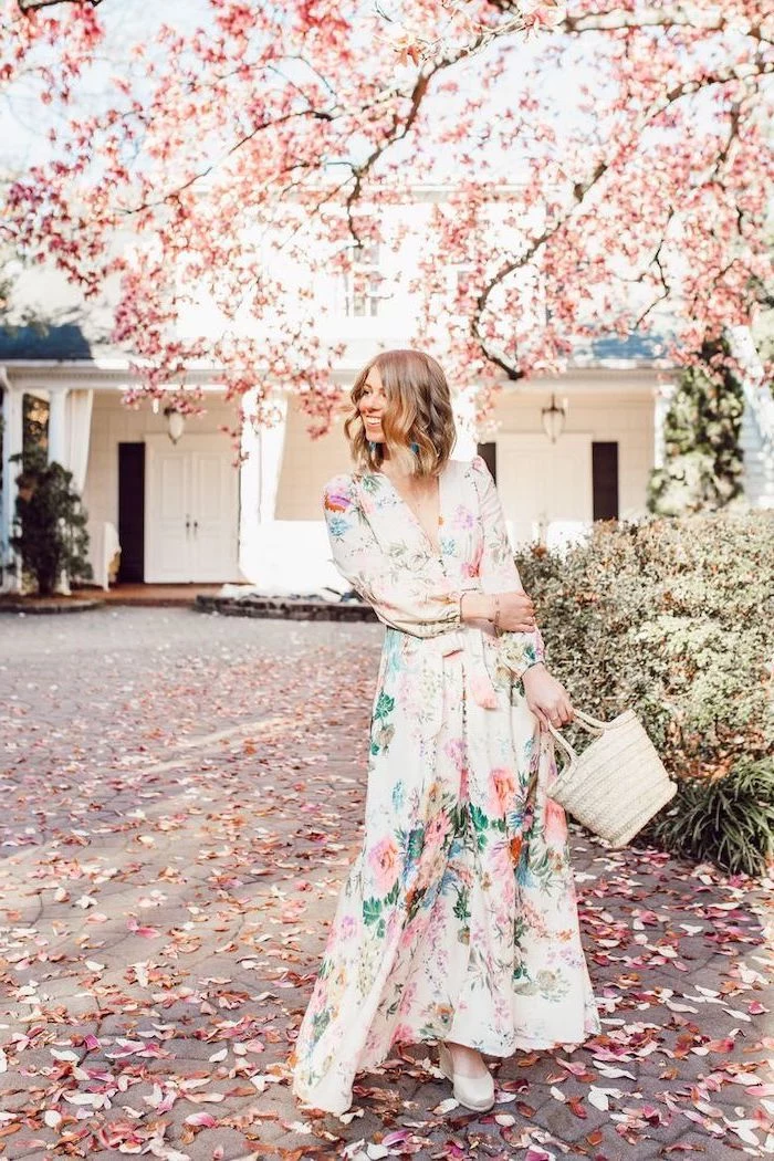woman with short blonde hair, wearing a long dress with floral print, easter dresses 2019, white sandals