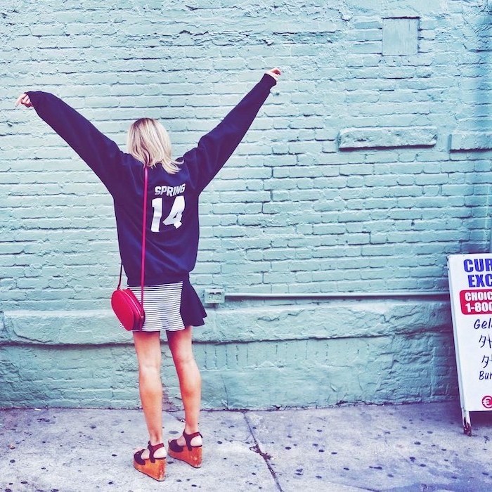 blonde girl wearing black sweatshirt, black and white striped skirt, middle school outfits, high sandals