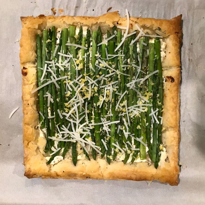 puff pastry with asparagus and cheese inside, easter dinner ideas 2019, placed on white baking paper