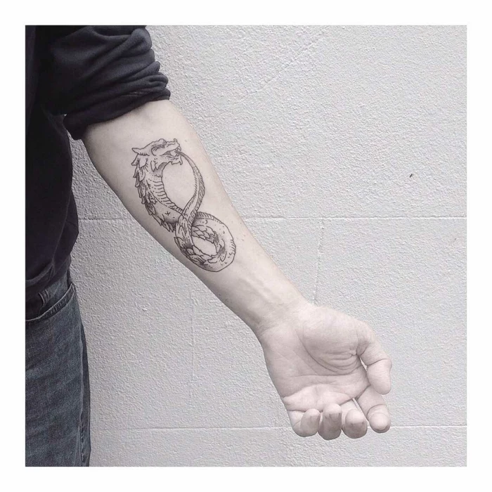 dragon as an infinity symbol, forearm tattoo, ouroboros dragon, white background