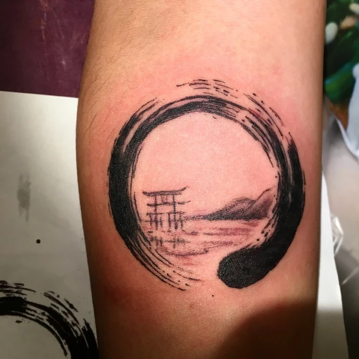 japanese ocean landscape, inside black circle, snake eating its own tail, forearm tattoo