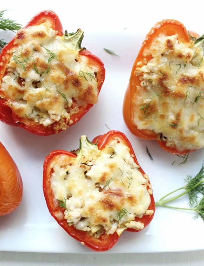 stuffed bell peppers, cut in half and filled with quinoa and cheese, easy weeknight dinners, garnished with dill