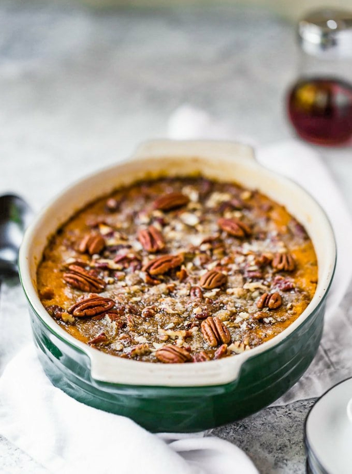 sweet potato casserole with pecans on top, easter dishes, baked in a ceramic casserole dish