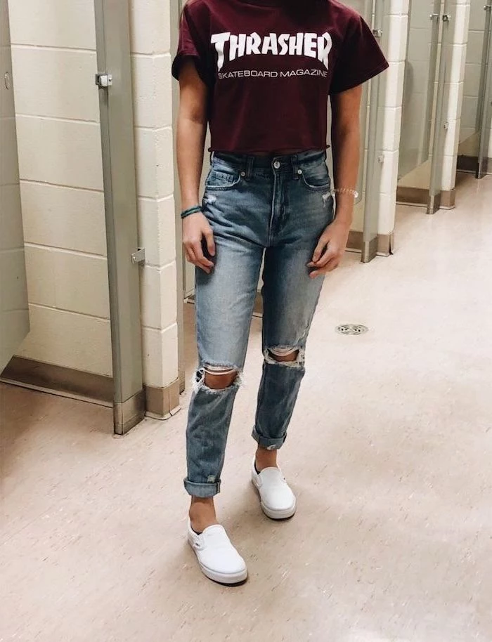 burgundy thrasher t shirt and jeans, cute high school outfits, white vans shows, girl standing in school bathroom