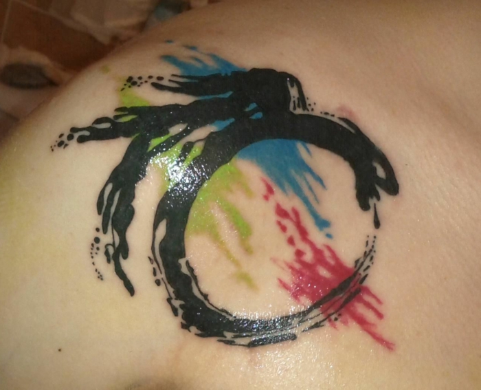 watercolor shoulder tattoo, dragon with wings, blue red and green strokes, snake eating itself meaning