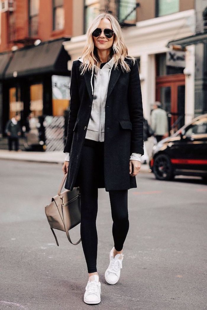 blonde woman wearing black leggings, grey sweatshirt and black coat, white sneakers, cute lazy outfits