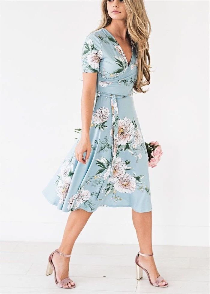 woman with long blonde hair, wearing a blue wrap dress with floral print, cute easter outfits, nude heels