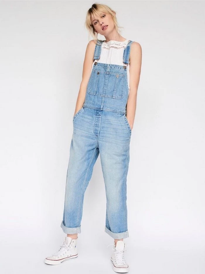 high school cute outfits, blonde woman wearing denim overalls, white top, white high top converse shoes