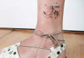 Showcase your adventurous spirit with a mountain range tattoo