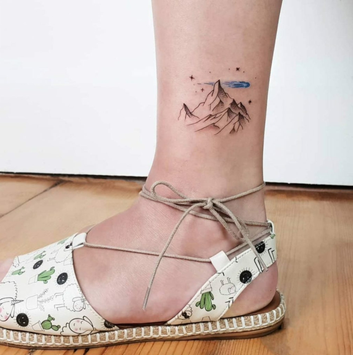 ankle tattoo, mountain range, blue watercolor clouds and stars, mountain range tattoo, white sandals with kawaii print