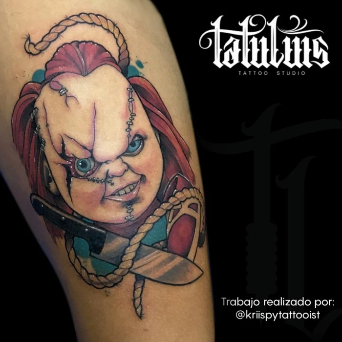 chucky from child's play, neo traditional rose, thigh tattoo, black background