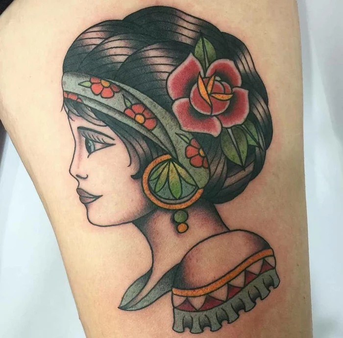 woman with black hair, floral headband and red rose in her hair, traditional tattoo ideas, thigh tattoo