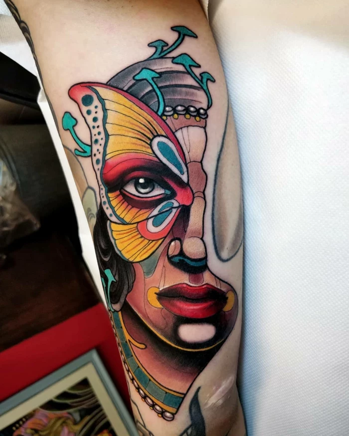 half of a female face with butterfly on her eye, neo traditional tattoo, back of arm tattoo