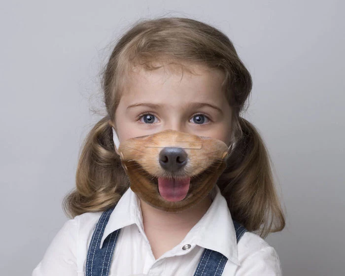 little blonde girl with blue eyes, wearing face mask with a dog face printed on it, how to make a breathing mask