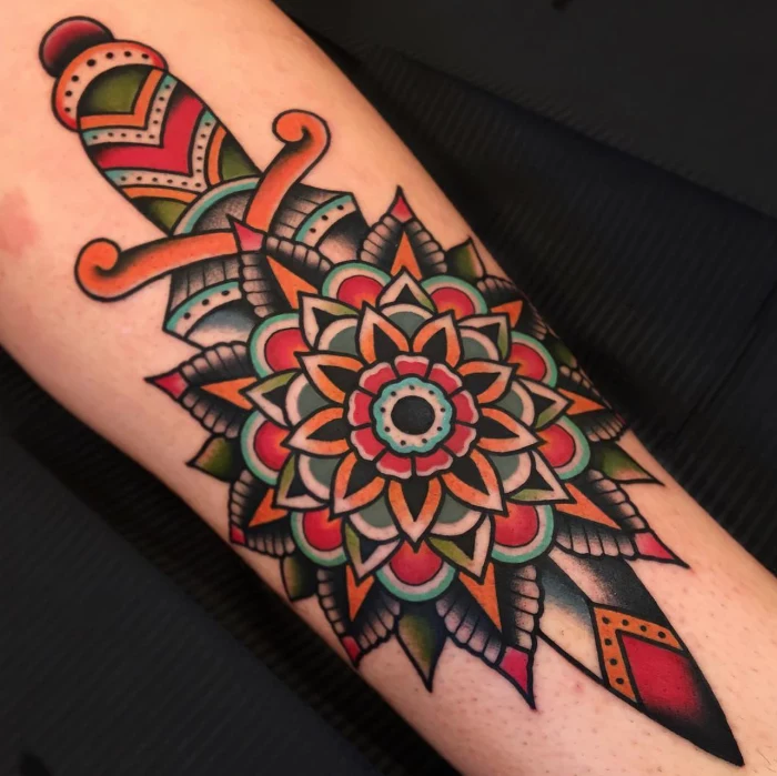 mandala tattoo, neo traditional rose tattoo, dagger with mandala flower, forearm tattoo