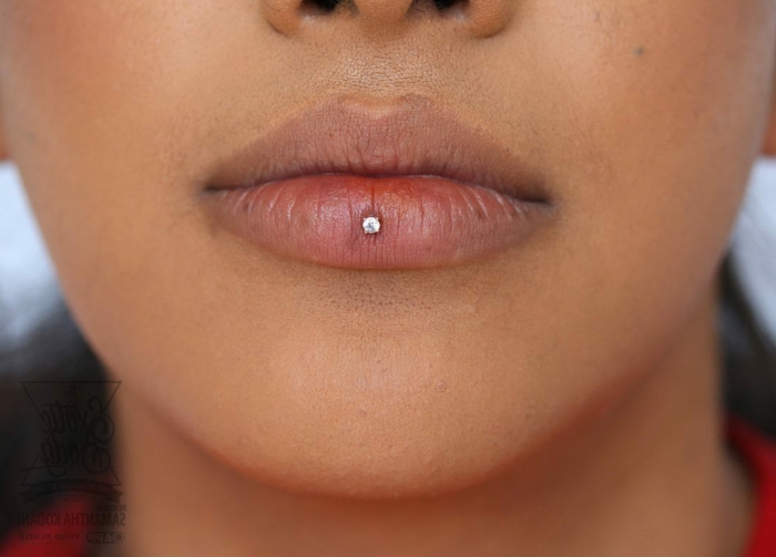 close up photo, labret lip piercing, lips with no lip gloss