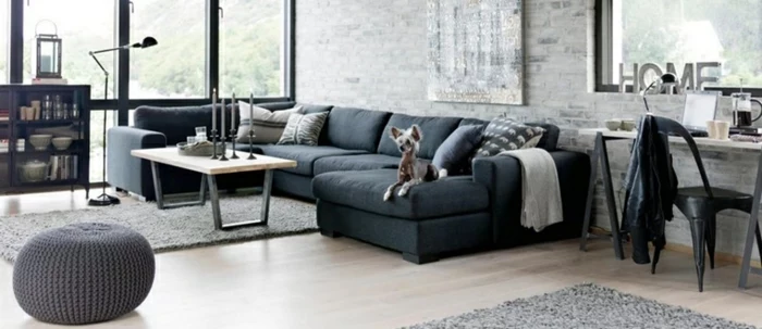 black corner sofa, grey knitted ottoman, how to decorate your living room, wooden coffee table