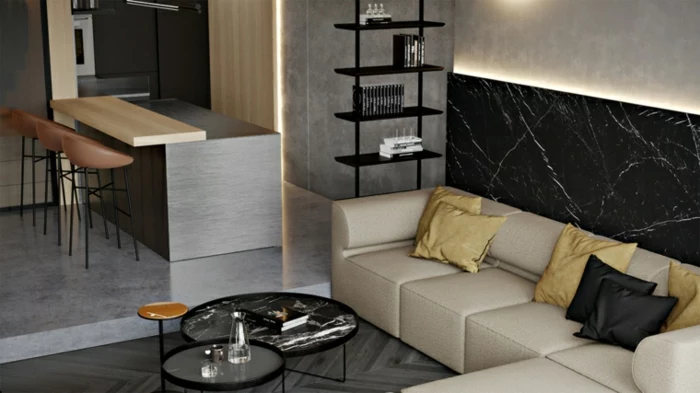 how to decorate a living room, marble accent wall, white leather corner sofa, kitchen island with bar stools