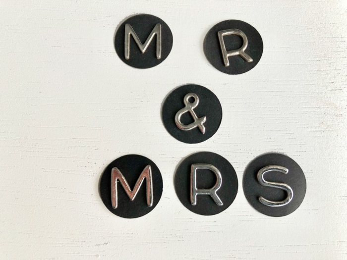black dots, mr and mrs written with silver letters, wedding congratulations, white background