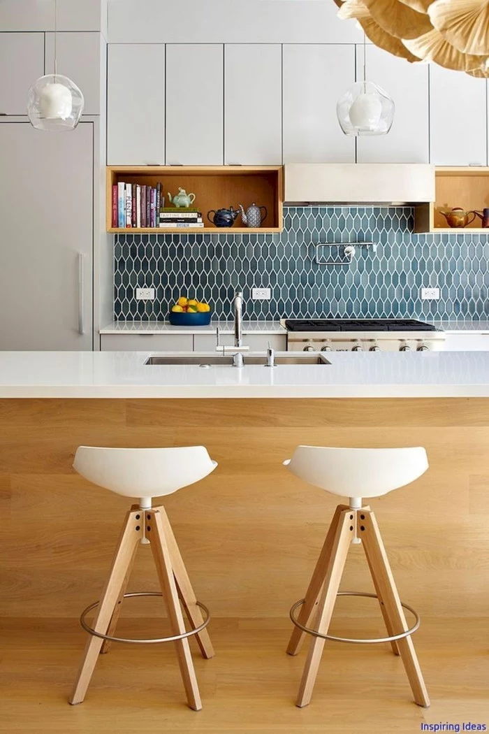 white cabinets with open shelving, mid century kitchen, blue tiles backsplash, wooden kitchen island, white countertops