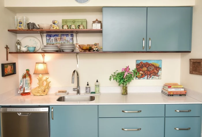 mid century modern cabinet, blue cabinets with white countertop, open shelving, white backsplash