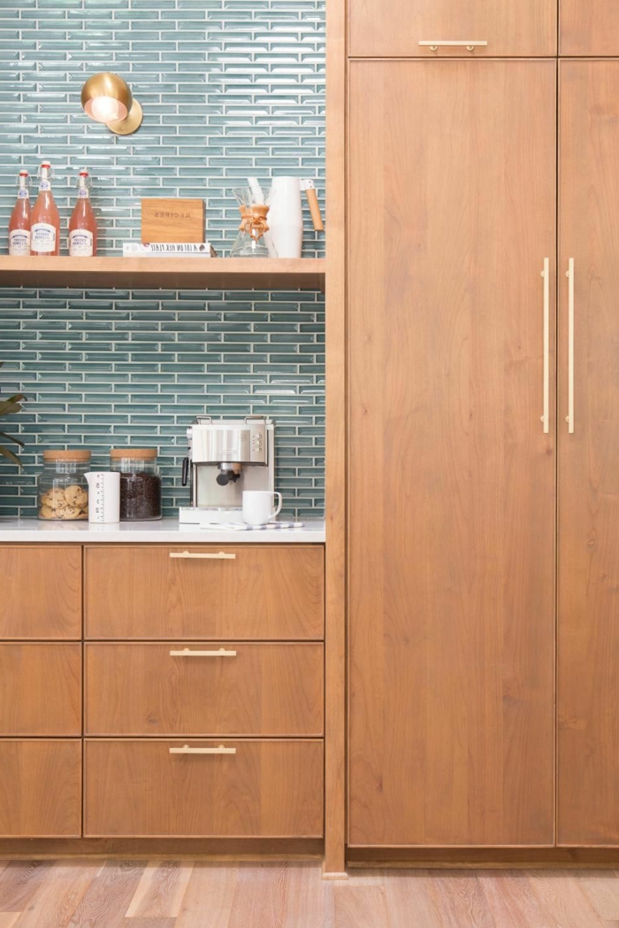 blue subway tiles backsplash, open shelving, mid century modern cabinet, wooden cabinets with white countertops