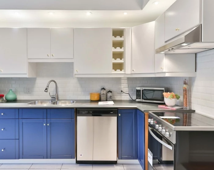 blue cabinets with grey countertop, mid century modern cabinet, white cabinets, white subway tiles backsplash