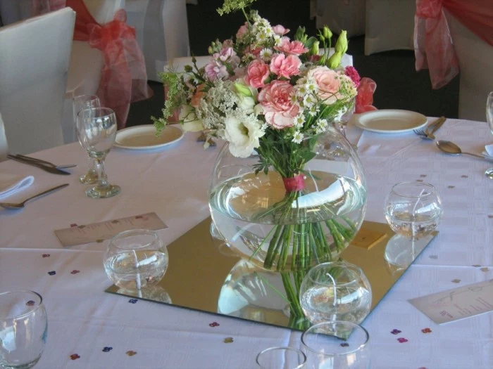 flower arrangement with pink and white flowers, placed in the middle of table, 80th birthday decorations