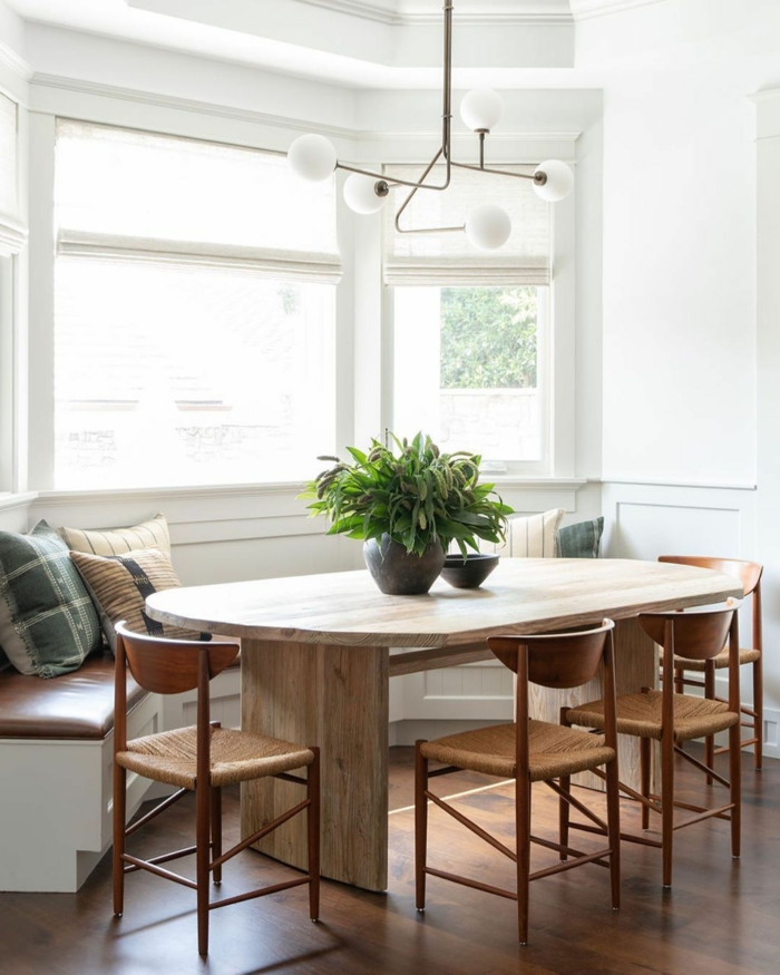 wooden chairs and table, mid century modern kitchen cabinets, bench with brown leather cushions