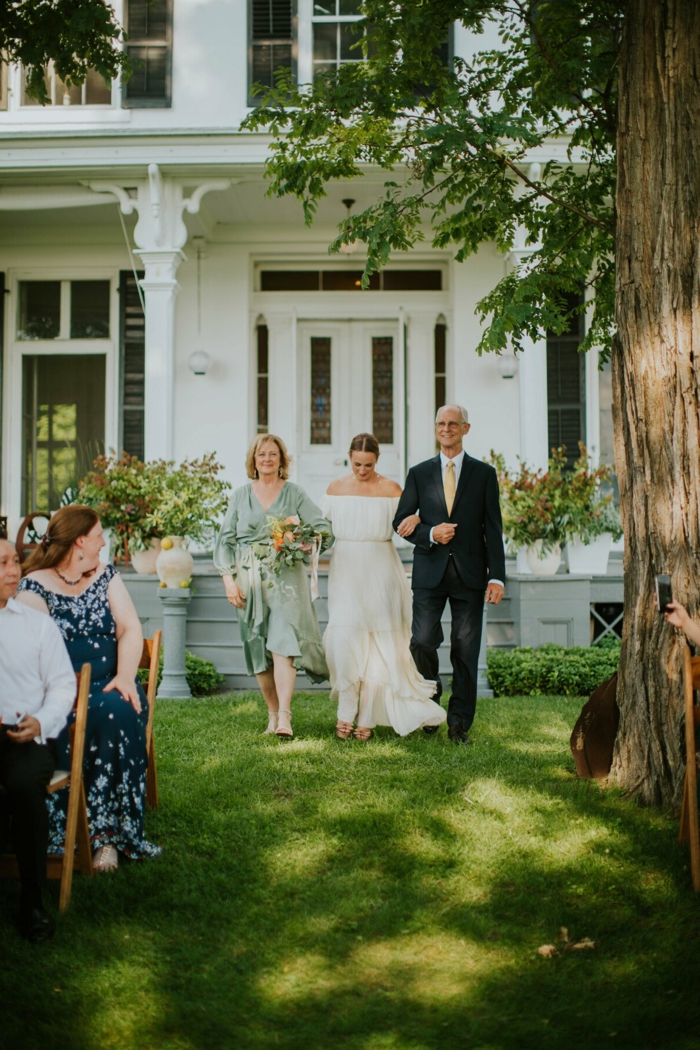 bride being walked down the aisle by her mother and father, wedding entrance songs, garden wedding