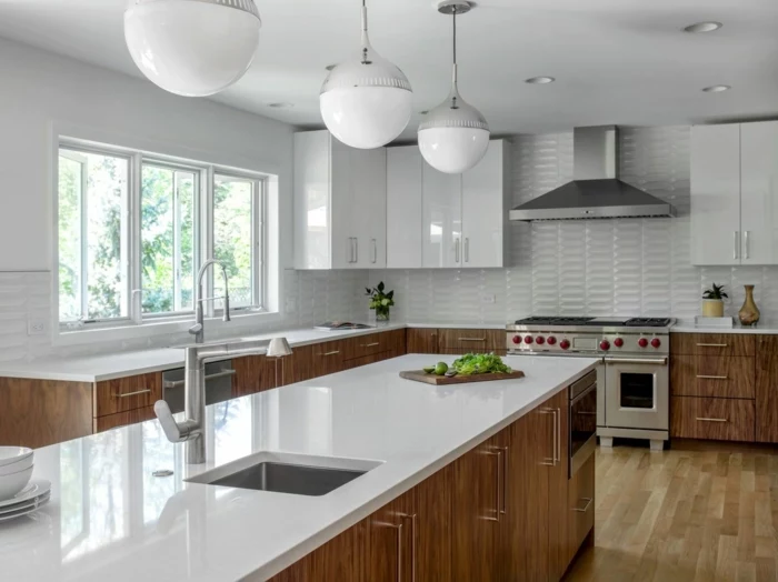 wooden cabinets with white countertops, white subway tiles backsplash, mid century modern kitchen cabinets